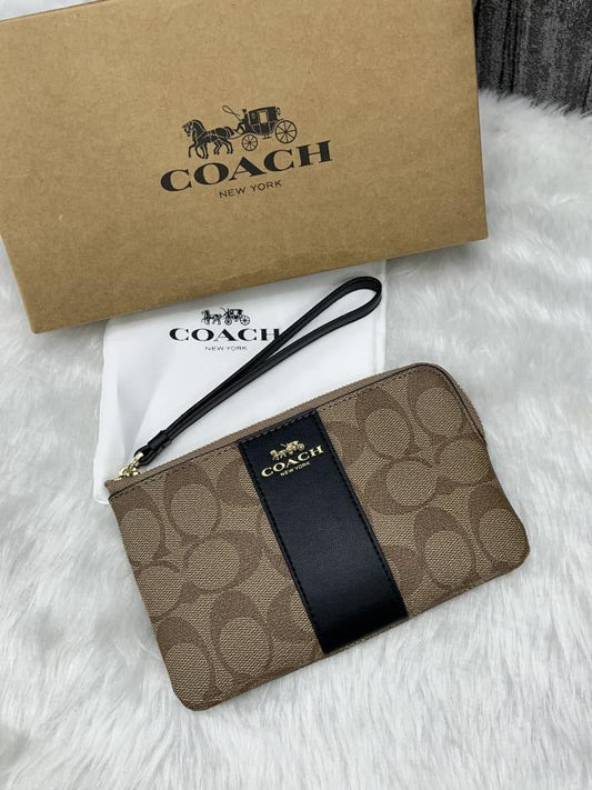 COACH W7 CORNER WRISTLET SIGNATURE WITH OG BOX & DUST COVER Urban Classics Store
